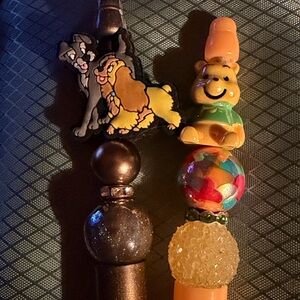 Winnie the Pooh, and Lady and the tramp pens